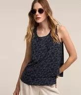 Oferta de Blusa em Crepe com Zíper nas Costas e Estampa de Poá Entrelaçado por R$89,9 em Renner