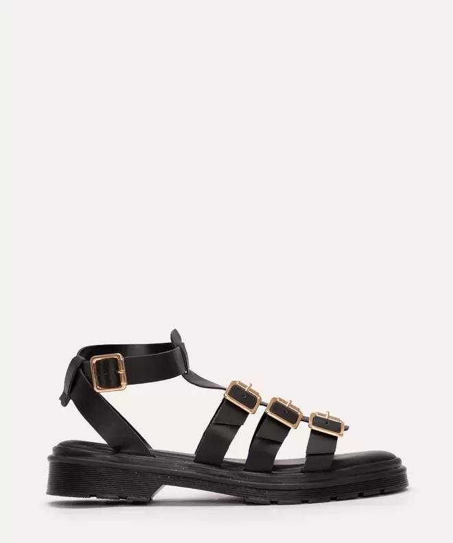 Oferta de Sandália flatform com fivelas via uno preta por R$75,99 em C&A