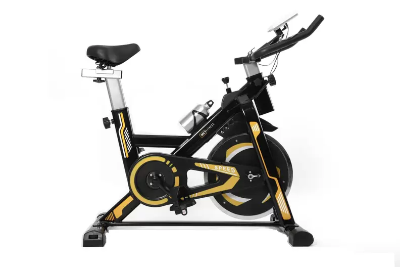 Oferta de BICICLETA SPINNING COM RODA DE INERCIA DE 13KG - PRETO E AMARELO por R$1559,98 em Decathlon