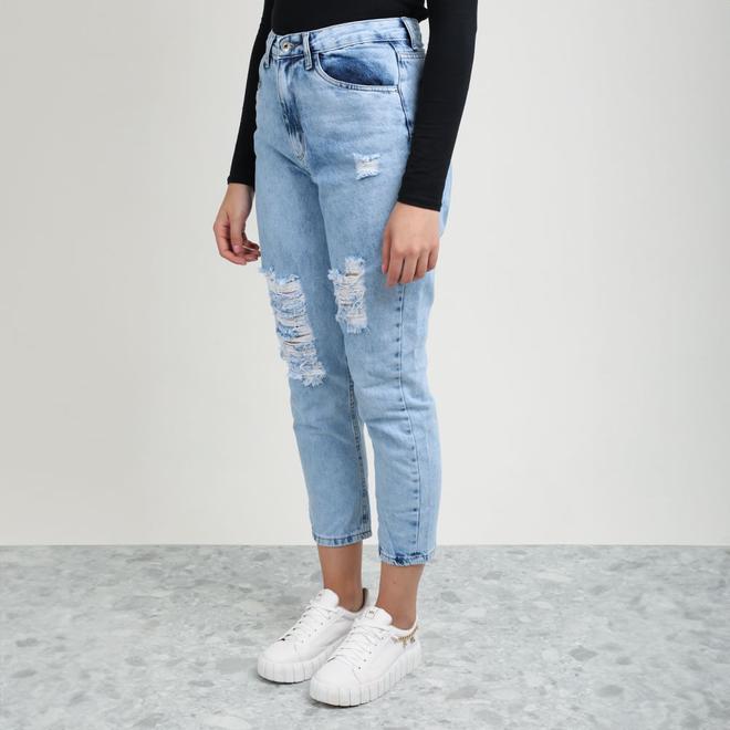 Oferta de Calca Jeans Mom Delave Com Puidos por R$99,99 em Di Gaspi